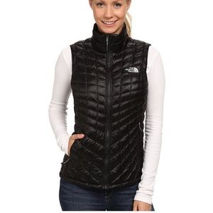 Black North Face puffy vest
